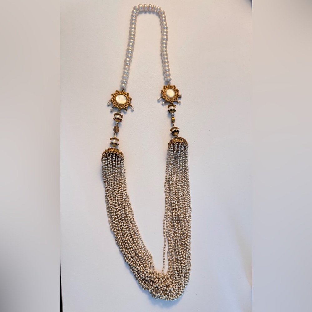 Gold and Cream Multi-Strand Necklace with Vintage-Inspired Design